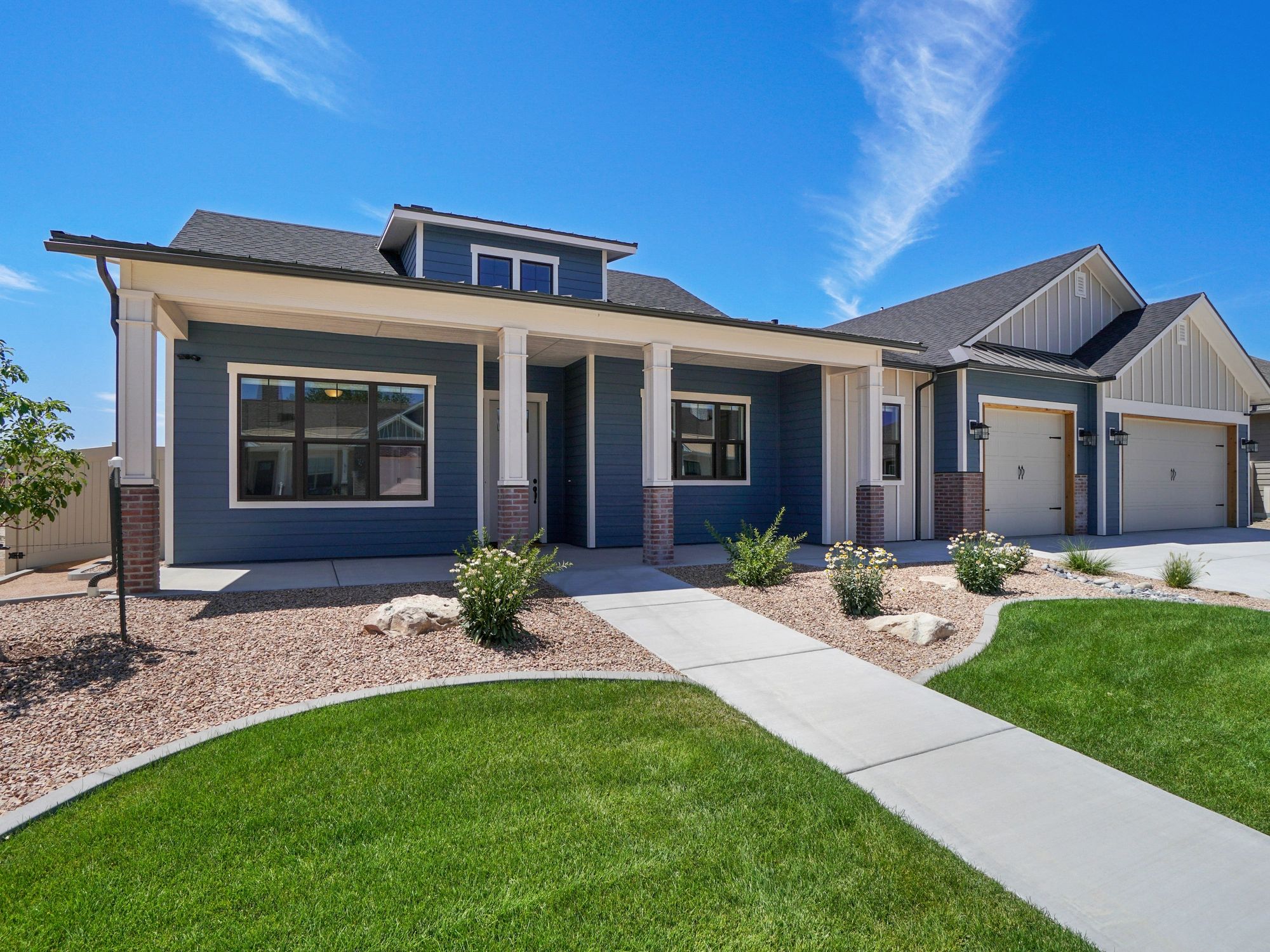 Front view of luxury two garage home with